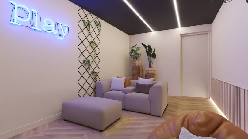 Gameroom kelder Moderne woonkamer met een 'Play'-neonlicht en comfortabele meubels.