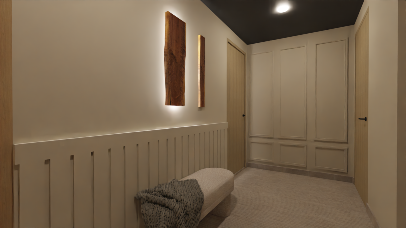 Hal kelder Lichte gang met beige muren, een bench en moderne wanddecoraties.